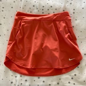 Nike athletic skirt with built in shorts and pockets